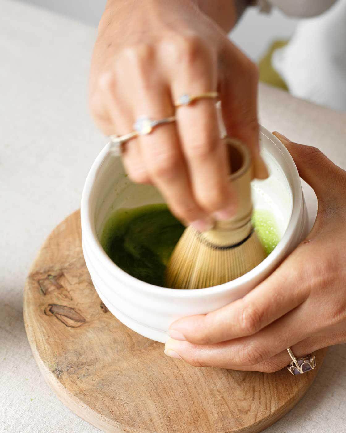 Whisking matcha in this beautiful Chawan Matcha Bowl sold at Matchakin