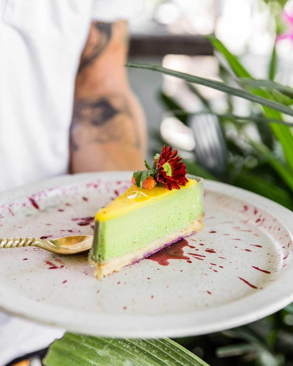 Classic gluten-free matcha cheesecake with lemon lime cream